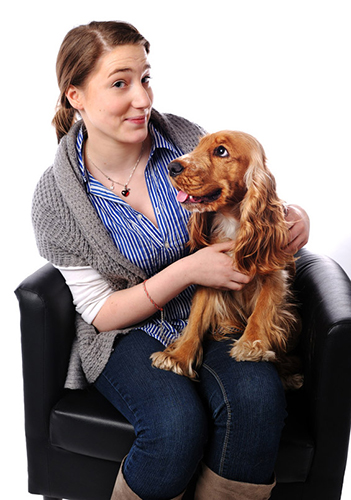 woman with spaniel on lap